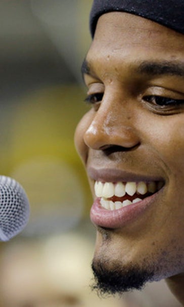 Newton to Oher: 'I need you' to play in Carolina